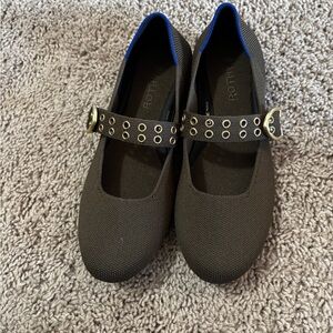 Rothy's Black Mary Jane Flats with Gold Grommet Strap and Blue Trim